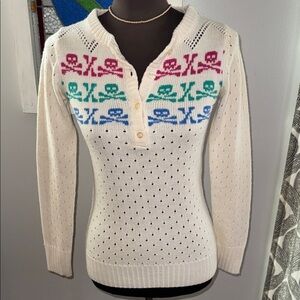 dELiA*s Cream Sweater with Pink, Green, and Blue Skull Design